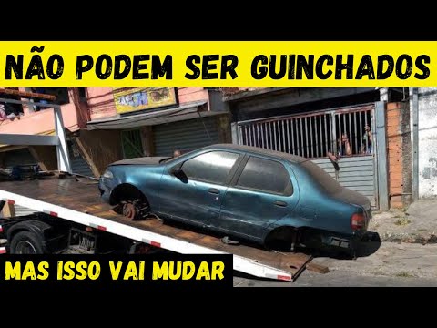 Como posso denunciar carros estacionados na rua?