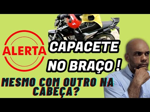 Por que é multado quem usa capacete no braço?